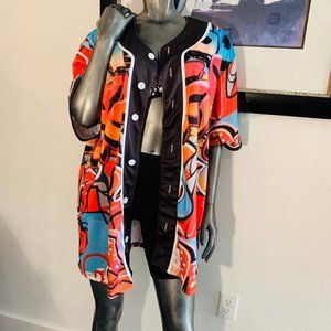 Vibrant oversized gaffiti button-up top.